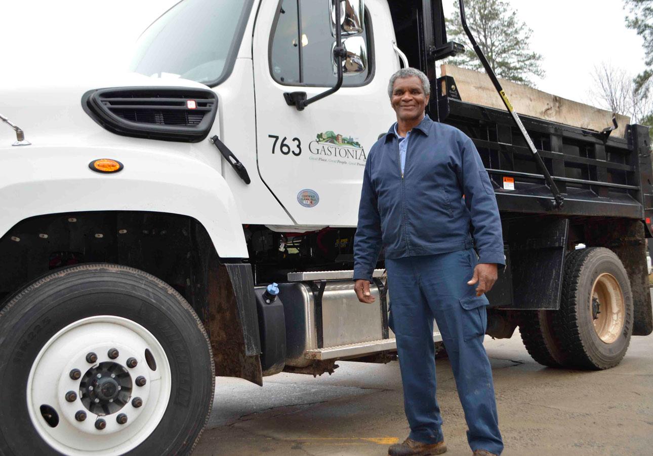 George Sadler by truck COG Awards photo